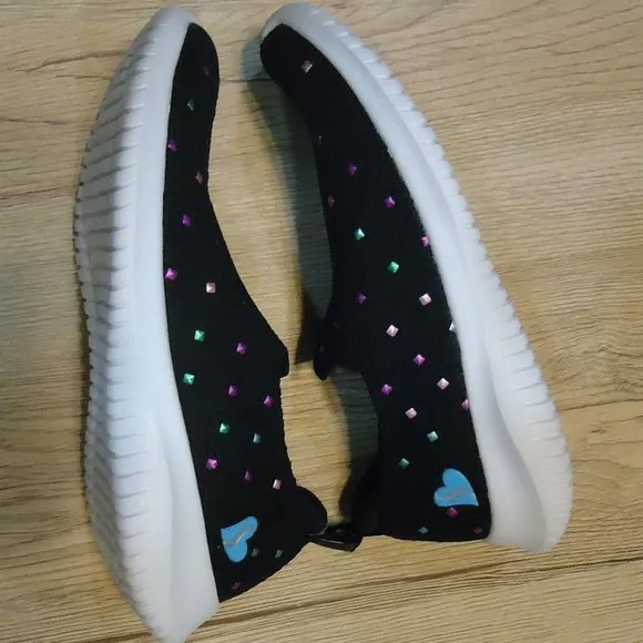 SIZE 12. Skechers air-cooled memory foam slip-on sneakers.