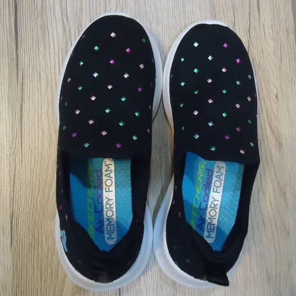 SIZE 12. Skechers air-cooled memory foam slip-on sneakers.