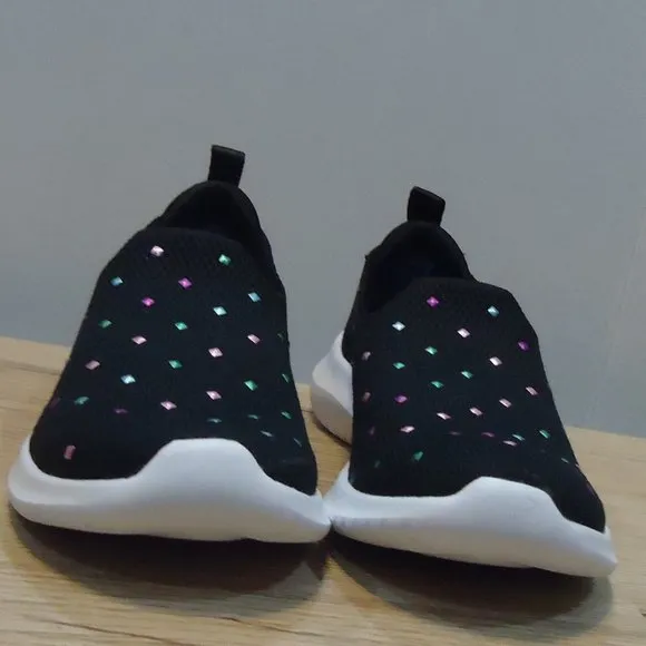 SIZE 12. Skechers air-cooled memory foam slip-on sneakers.