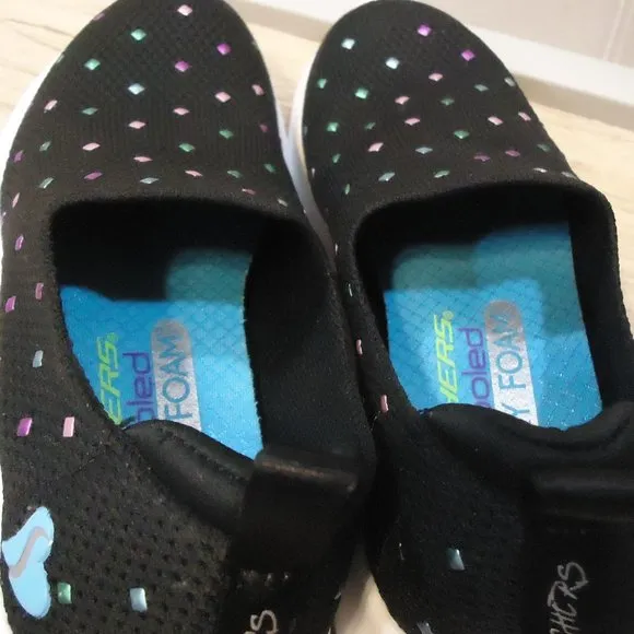 SIZE 12. Skechers air-cooled memory foam slip-on sneakers.