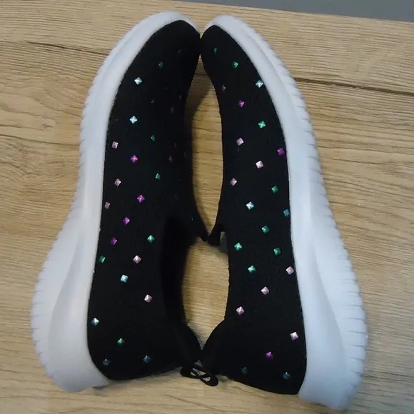 SIZE 12. Skechers air-cooled memory foam slip-on sneakers.