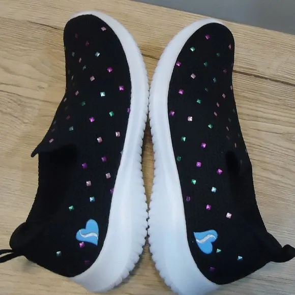 SIZE 12. Skechers air-cooled memory foam slip-on sneakers.