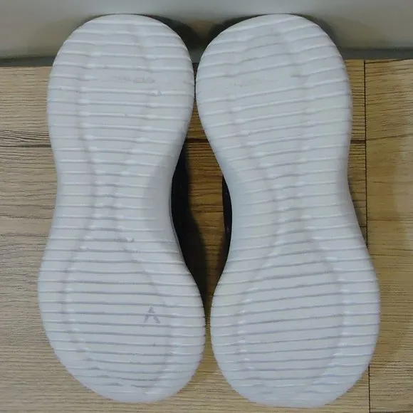 SIZE 12. Skechers air-cooled memory foam slip-on sneakers.